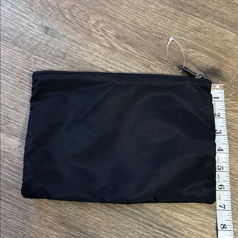 NWOT Tumi Zippered pouch